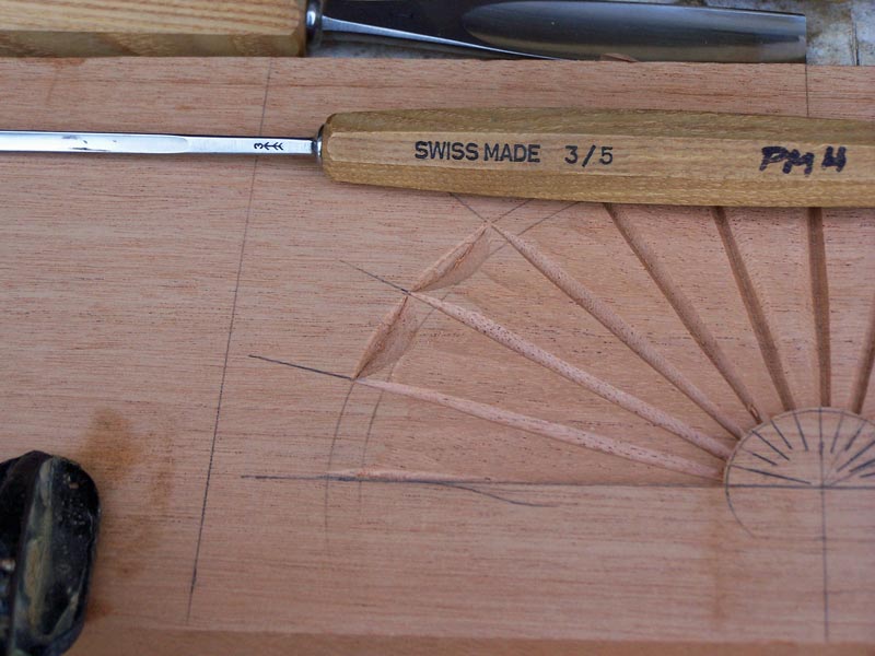 Cut away the rest of the scallop
